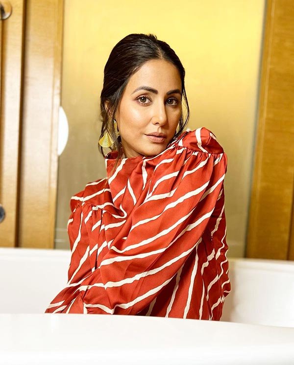 Hina Khan legs short red outfit bathtub photoshoot Hina Khan legs short red outfit bathtub photoshoot