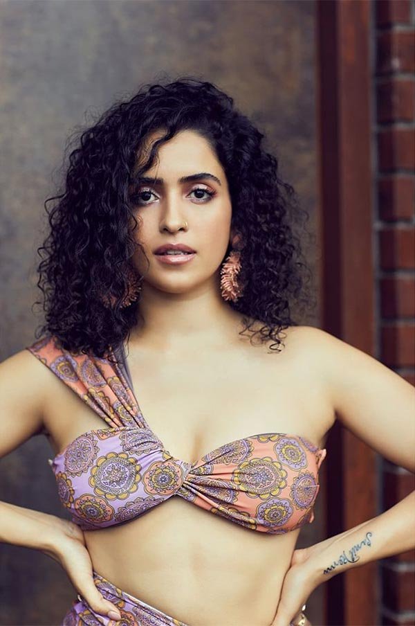 Sanya Malhotra bikini top high slit skirt legs
